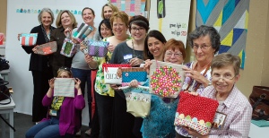 Happy polka dot people with their new bags.
